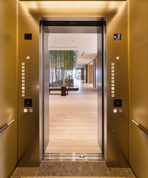 Kamai Gold Luxury Lift with premium gold finish cabin interior