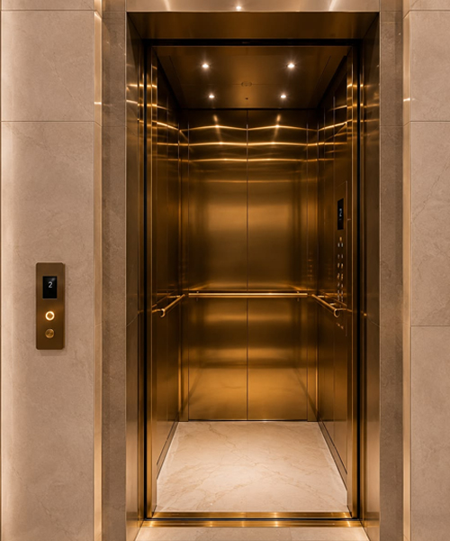 Gold Luxury Lift cabin with LED lighting and designer ceiling